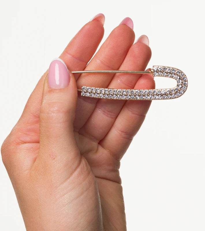 Eleganta zeltaina piespraude ar cirkonu