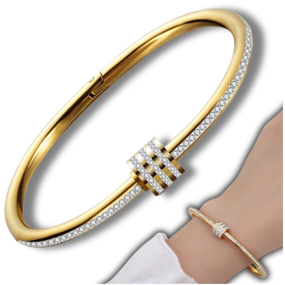 Zelta stingra aproce ar cirkoniem