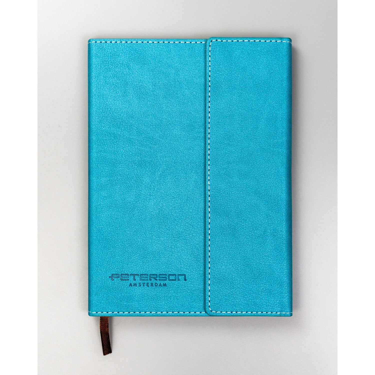 Dāvanu komplekts: tirkīza piezīmju grāmatiņa ar magnētisko aizdari un melna pildspalva