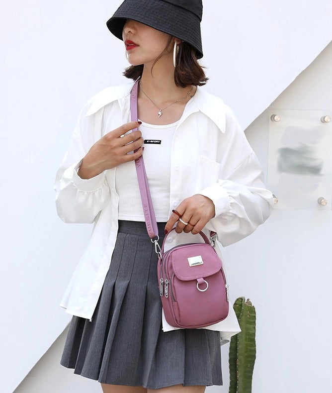 Maza sieviešu rokassomiņa S11, rozā krāsā