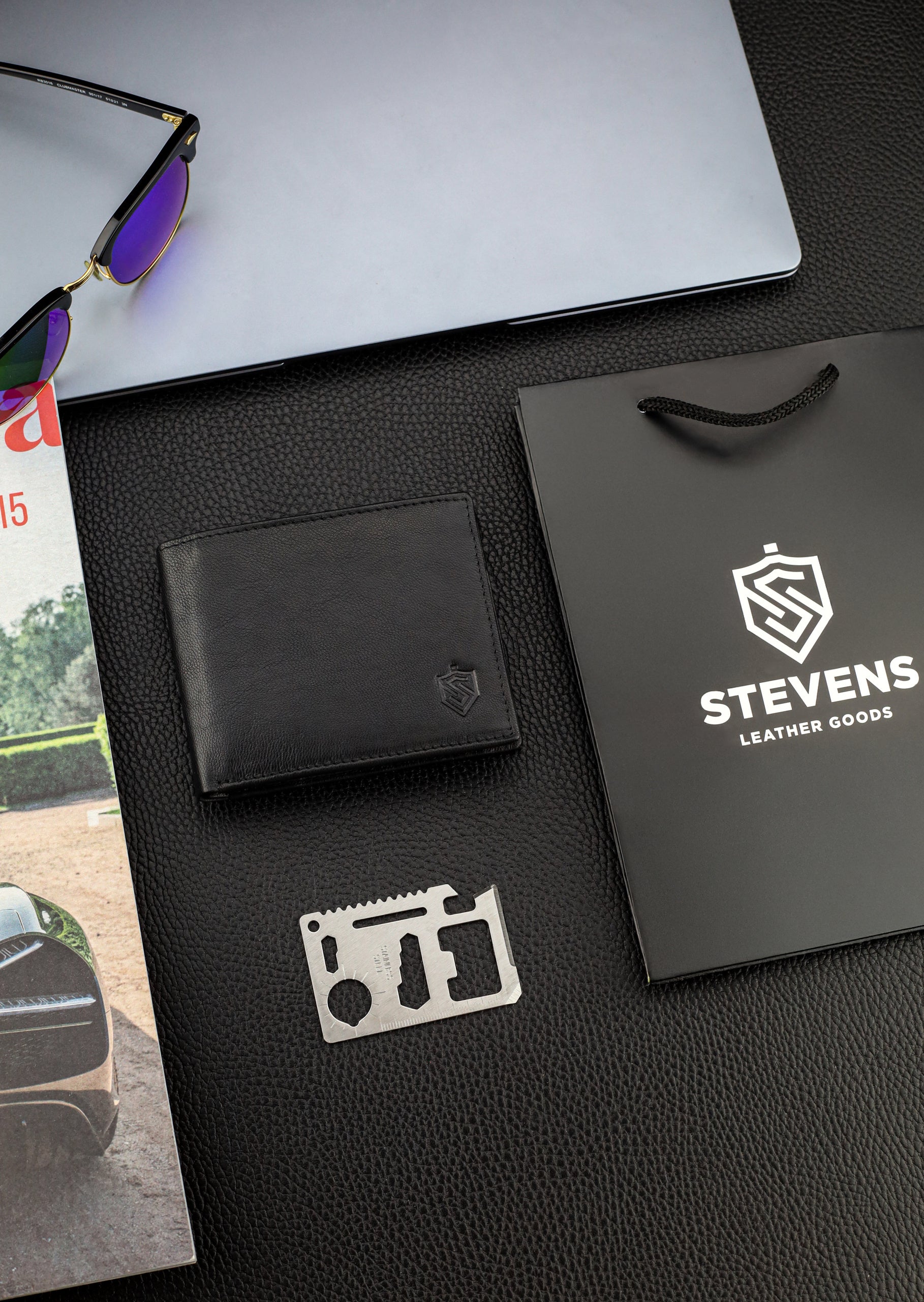 Dāvanu komplekts vīriešiem – STEVENS ādas maks ar RFID aizsardzību, izdzīvošanas karte un dāvanu maisiņš 8824