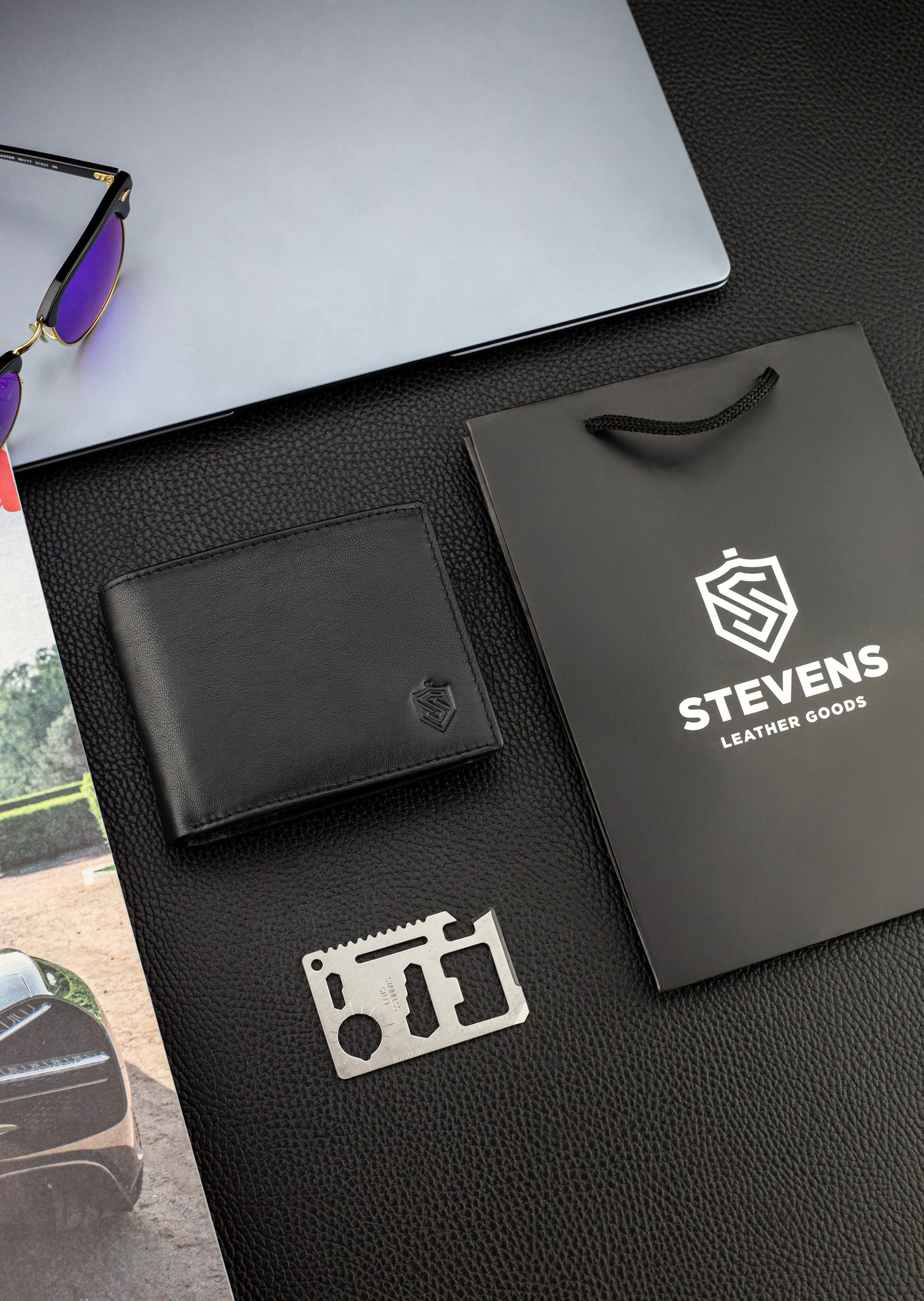 Dāvanu komplekts vīriešiem – STEVENS ādas maks ar RFID aizsardzību, izdzīvošanas karte un dāvanu maisiņš 325